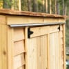 Wooden shed with sliding doors