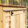 Wooden shed with sliding doors