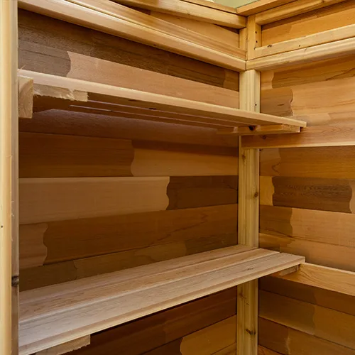 Interior shelves of cedar garden shed