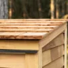 Cedar shed with wooden shingle roof