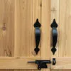 Wooden doors with black metal handles