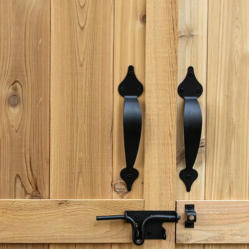 Wooden doors with black metal handles