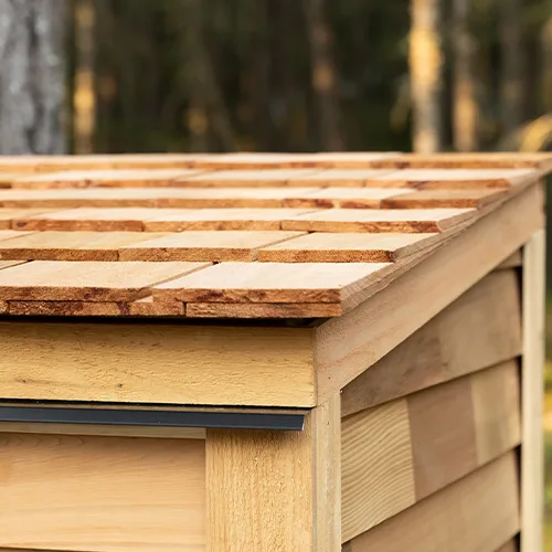 Cedar shed with wooden shingle roof