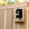 Close-up of wooden shed hinge