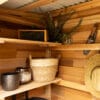 Wooden shed interior with organized storage.