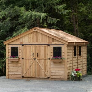 Wooden shed surrounded by greenery