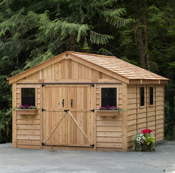 Wooden shed surrounded by greenery