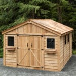 Wooden shed surrounded by trees