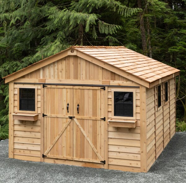 Wooden shed surrounded by trees
