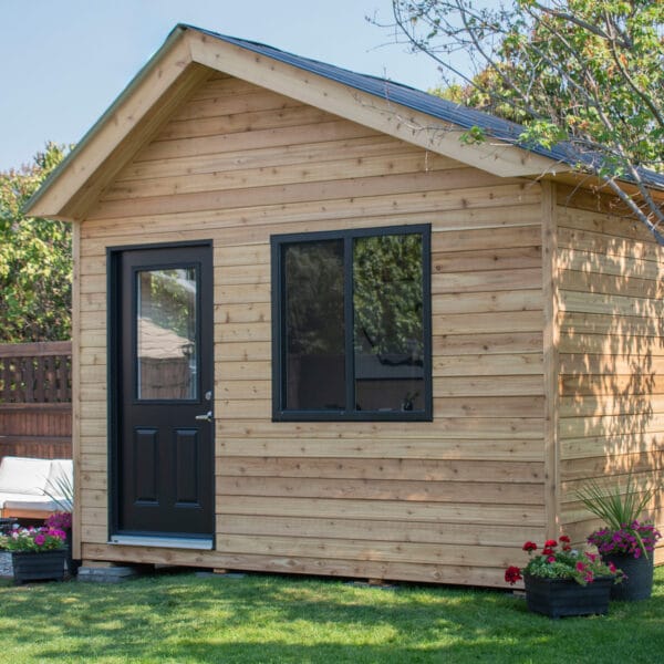 12×8 Saltbox Studio — Western Red Cedar Modern Outdoor Office 7 Wooden shed with black door and window.