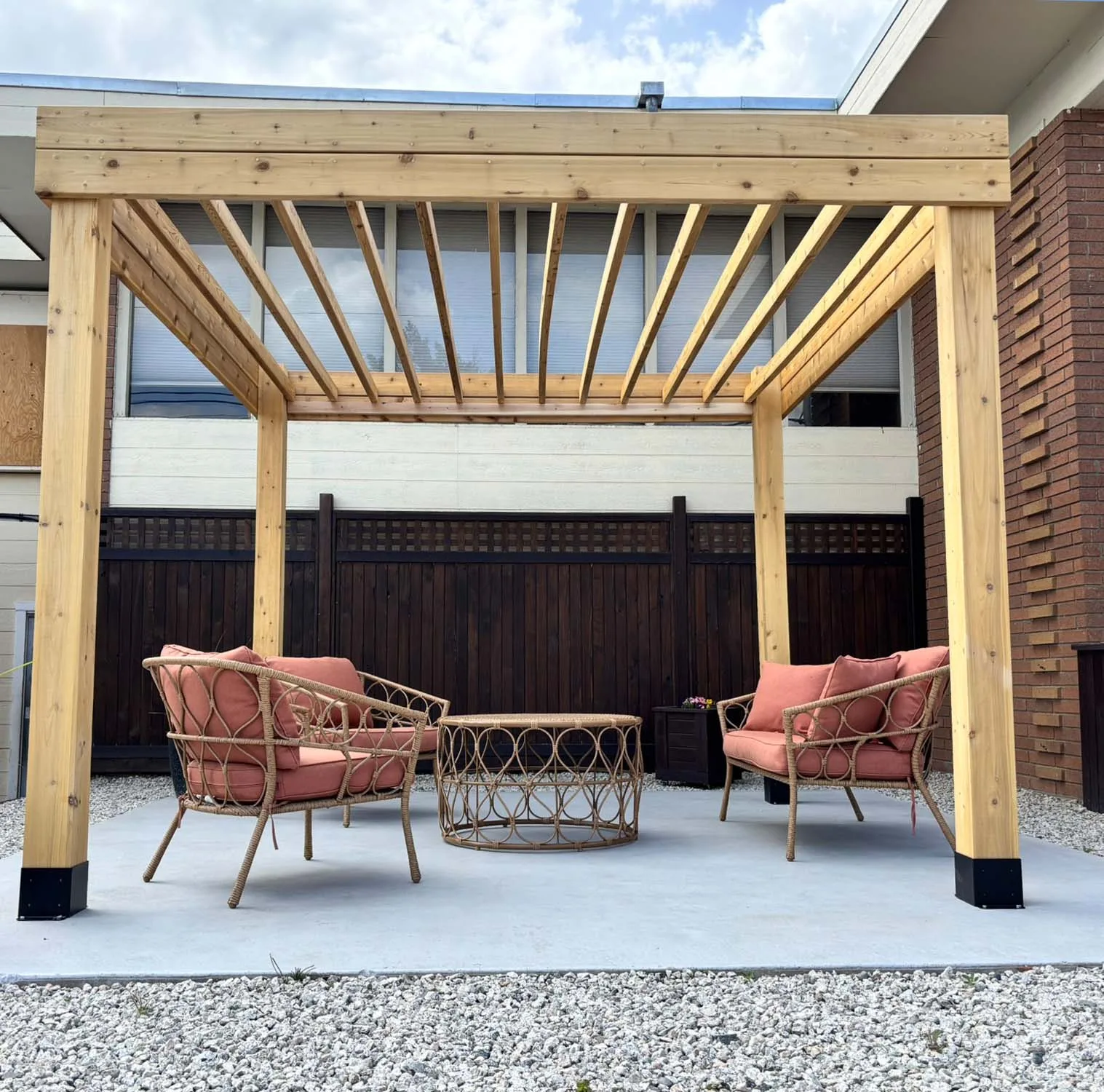 Wooden pergola with cozy seating area