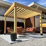 Wooden pergola with seating area