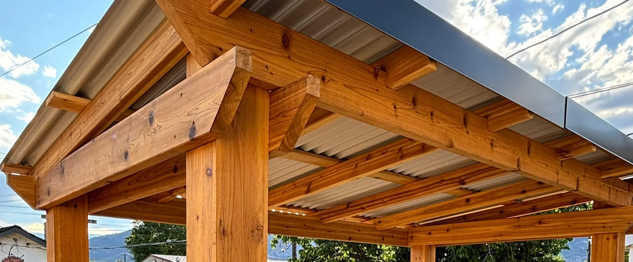 Wooden gazebo with metal roof