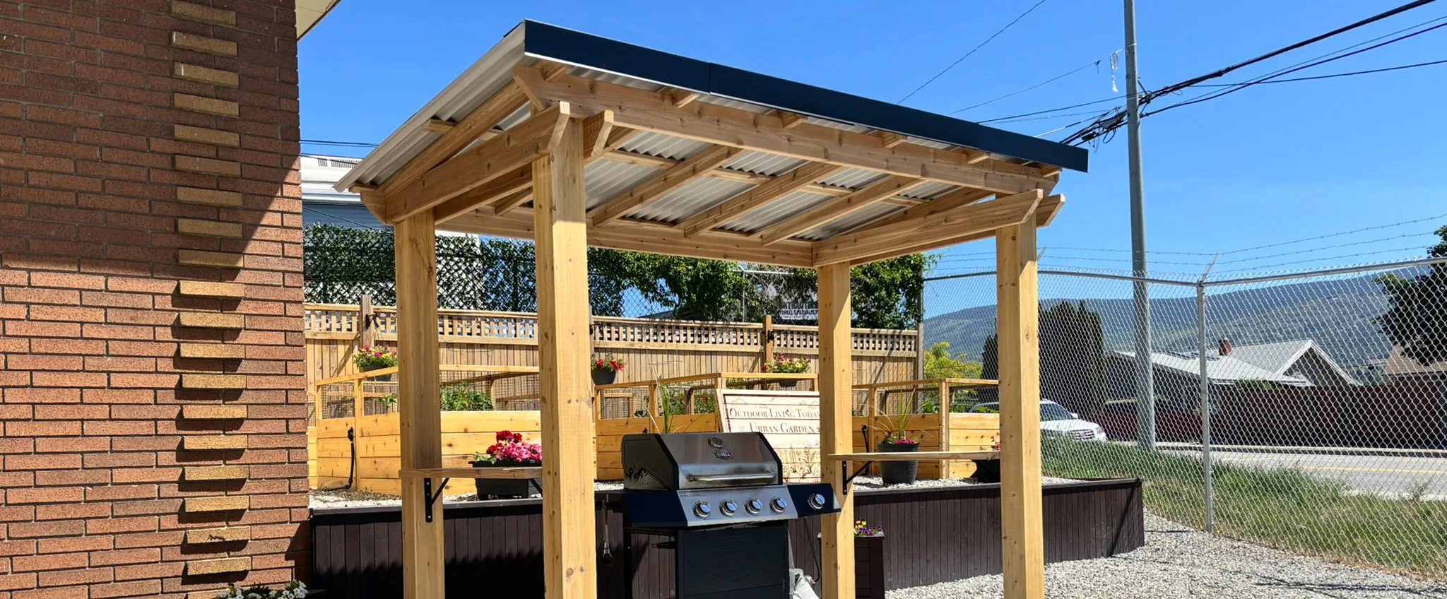 Wooden gazebo with grill setup
