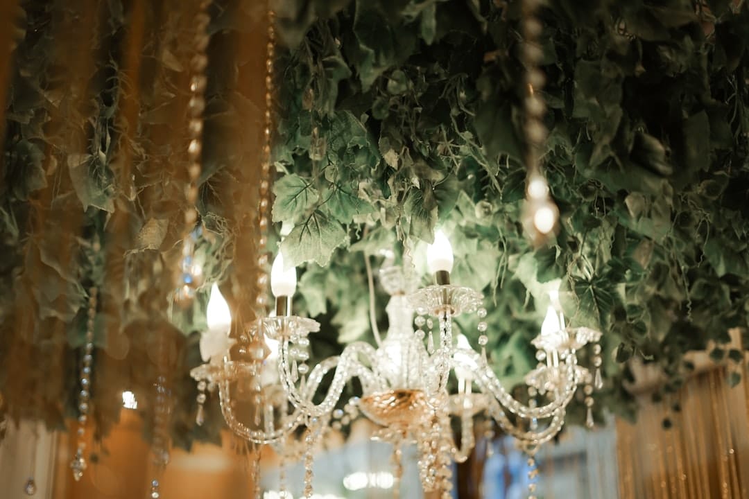 a chandelier hanging from a ceiling in a room
