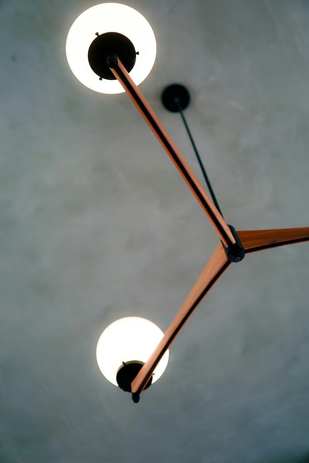 a couple of lights that are on a ceiling